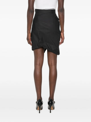 Mini Side Panther skirt with side gathering, draped detailing, and an asymmetric hem. Buttoned waistband and concealed zip. Available at our Lisbon store.