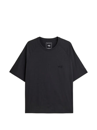 Y-3 logo-print raglan-sleeve T-shirt with a logo at the chest, short sleeves, loose fit, and 100% cotton. Available at our Lisbon store. 