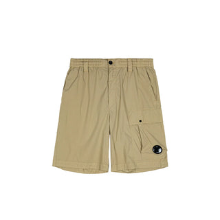 The C.P. Company 50 Fili Stretch Cargo Shorts, crafted from durable stretch cotton for superior comfort and iconic utility style. Available at our Lisbon store