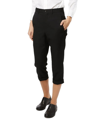 Black cropped trousers by Comme des Garcons