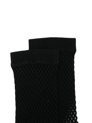 Black fishnes socks by Comme des Garcons