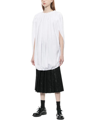 White gathered blouse by Comme des Garcons worn with black skirt and black shoes
