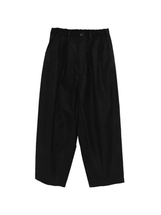 Black trousers with elasticated waist by Comme des Garcons Homme