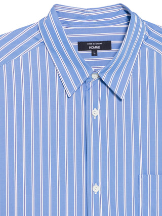 Blue and white striped shirt with a visible brand label by Comme Des Garcons Homme Plus