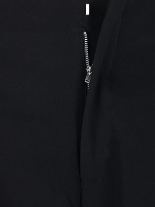 Zip detail on Black woolen trousers by Comme des Garcons Homme Plus. 