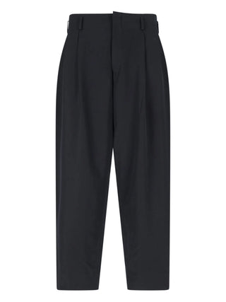 Black long trousers with with belt loops by Comme des Garcons Homme Plus