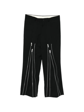 Black pants with zippers by comme des Garcons Homme Plus,