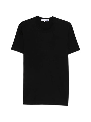 Black t-shirt with a small logo by Comme des Garcons