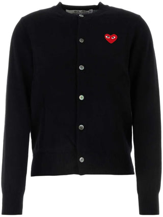 Black cardigan with a red heart logo 