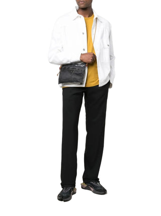 Person wearing the Klattermusen messanger bag with an outfit