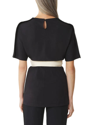 Black top with a white belt by Lanvin