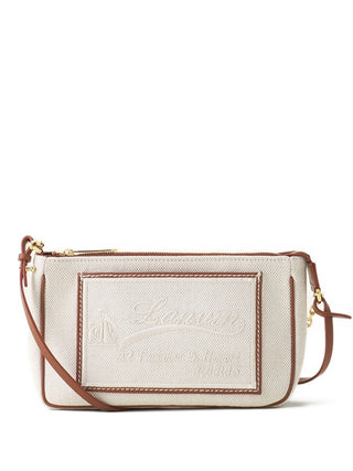 Beige crossbody bag with brown strap