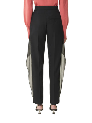 Black pants with a sheer panel by Lanvin