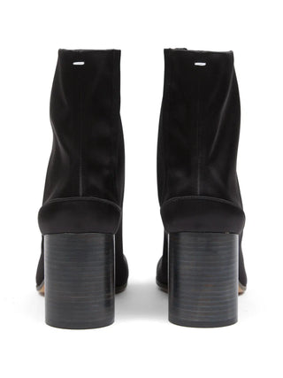 Black leather block heel ankle boots by Maison Margiela