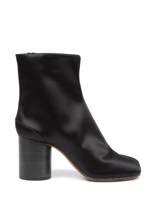 Black leather ankle boots by Maison Margiela