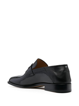 Black leather slip-on loafer by Maison Margiela