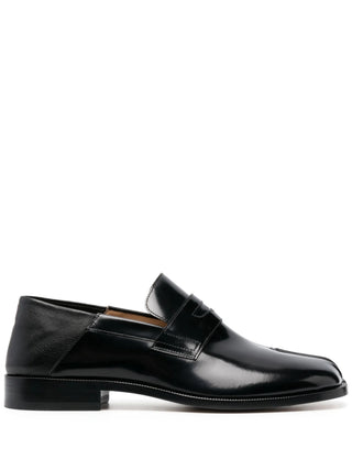 Black leather slip-on loafer by Maison Margiela
