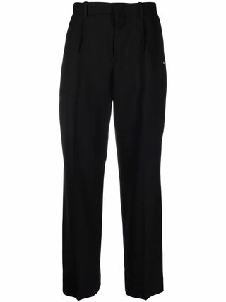 Crafted from virgin wool, these trousers feature a straight-leg with sharp pleats and finished with a zip fly, horn button detailing and side pockets.