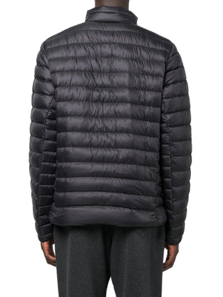 Black puffer jacket by Patagonia worn by a person