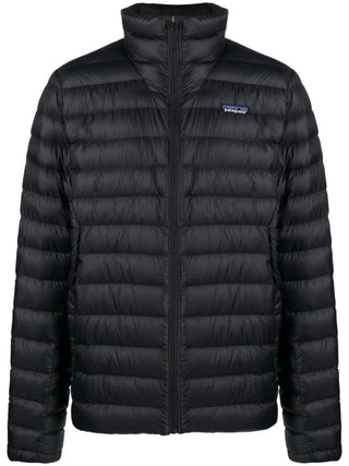 Black zip-up puffer jacket by Patagonia