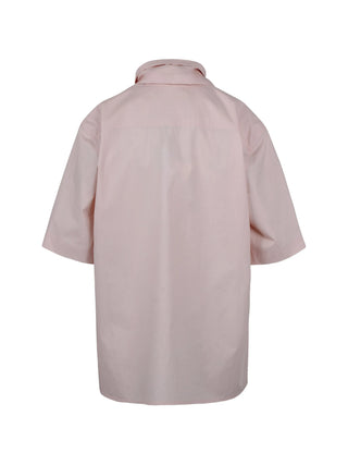 Pink short-sleeve shirt on a white background