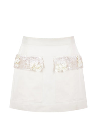 White mini skirt with sequins details on the pockets by Plan C.