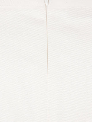 Close-up of a white cotton fabric with a consealed zip. 