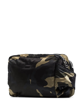 Camouflage-patterned pouch with a zipper by Porter-Yoshida and Co. 