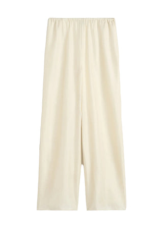 Silk trousers by Toteme