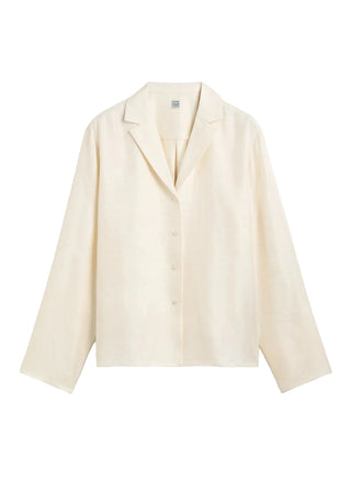 Beige silk top with long sleeves and collar by Toteme