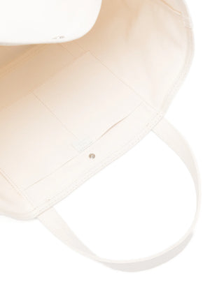 Close-up of a white tote bag by Toteme