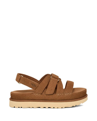 These strappy sandals from UGG come in brown, with a flat sole and a small logo detail. A back strap keeps your foot secure, so they're comfortable to wear all day. Pair them with denim, linen trousers or a summer dress for a relaxed warm-weather look. Available at our Lisbon store.