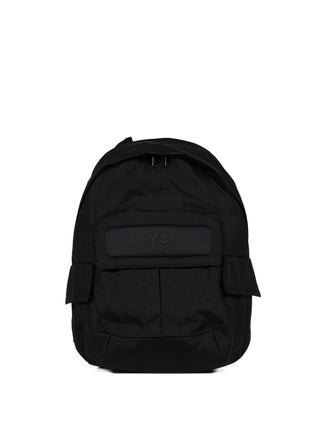 Black backpack with a visible brand logo by Y-3
