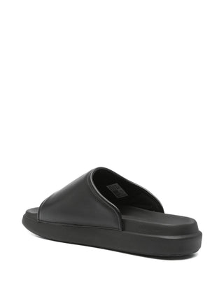 Black slide sandals with leather upper and rubber soles by Y-3