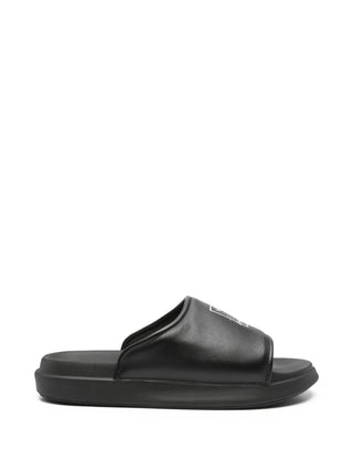 Black leather slides with rubber soles by Y-3